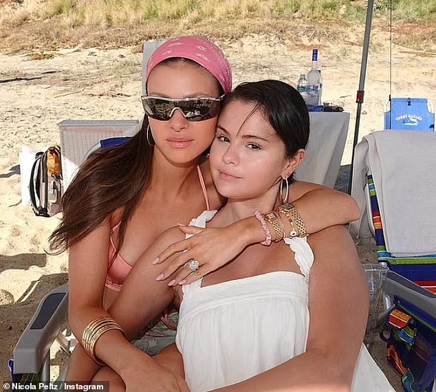 Romance?  It comes as the couple recently traveled to Mexico with Selena Gomez and friends to ring in the New Year (Nicola and Selena pictured together).