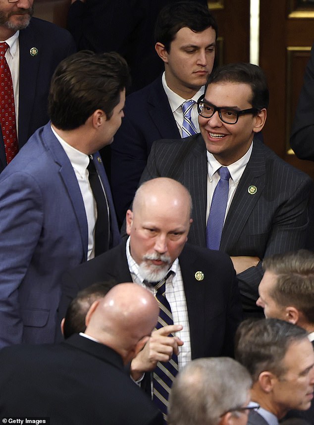 Representative-elect George Santos of New York (right) speaks with Representative-elect Matt Gaetz (R-FL) (left) in the House of Representatives during the second day of the Speaker of the House election at the U.S. Capitol. on January 04, 2023 in Washington, DC