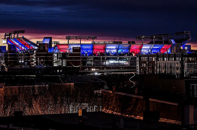 The Baltimore Ravens' M&T Bank Stadium was lit up in the bill's red and blue colors Tuesday.