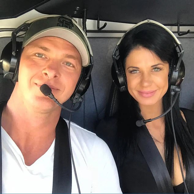 Sea World Helicopter Chief Pilot Ash 'Jenko' Jenkinson, 40, died in the helicopter crash (pictured with his fiancee, Kosha)