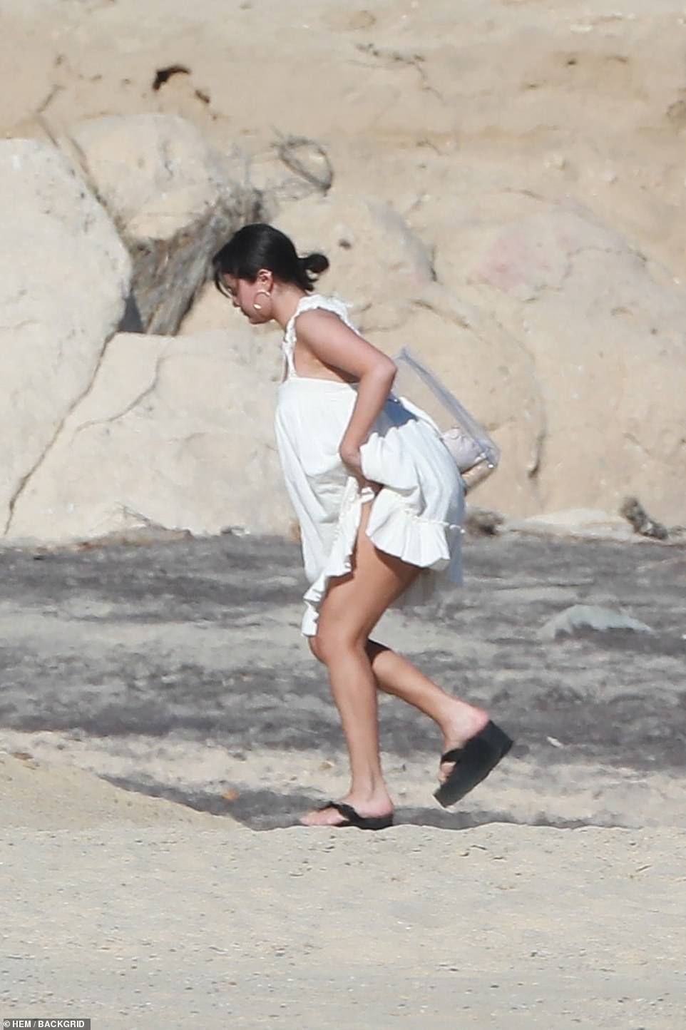 Stylish: Justin Bieber's ex finished off the beach look with chunky black platform flip-flops