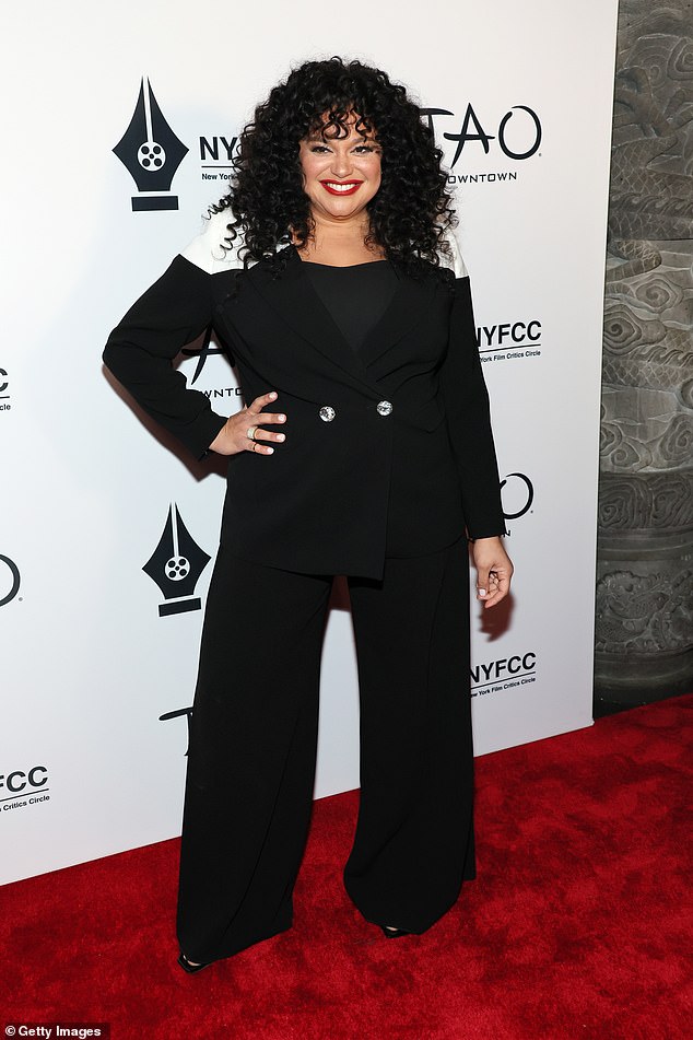 Volume!  Also present was American comedian Michelle Buteau, 45, who looked fashionable in a black pantsuit and sported her dark hair in voluminous curls.