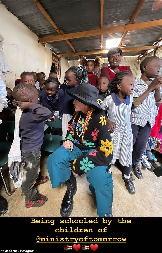 Visiting Africa: Just one day after building a beautiful mural out of broken glass of a dove and 'tree of life' in the southwestern suburb, the 64-year-old superstar went on to document his family's adventures