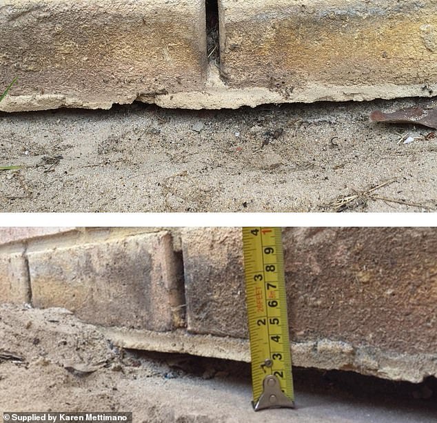 A gap in the exterior wall has been widened so much that the couple can fit their entire hand between the brick and the foundation (pictured)