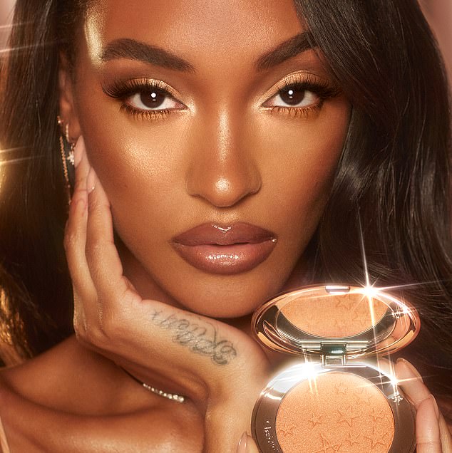 Flawless: Model Jourdan Dunn was simply beaming when she showed off the product in the midst of the stunning campaign