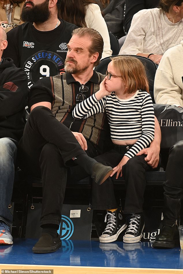 David's look: The Stranger Things star wore a short-sleeved black zip-down shirt, with matching black pants and black shoes, while Ethel wore a black and white striped top, black pants and Converse All-match sneakers Black stars.