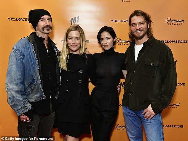 Stephen's look: Her husband, director Stephen Kay, went for a more casual look in a black shirt under a blue jean jacket with a black cap, black pants and black boots