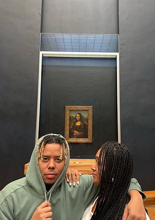 Mona Lisa was in the background while they visited Paris