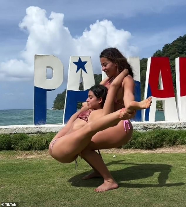 Kristina said that practicing yoga should always maintain mindfulness and feel connected to one's body on top of bikini-clad models doing complicated poses, pictured.