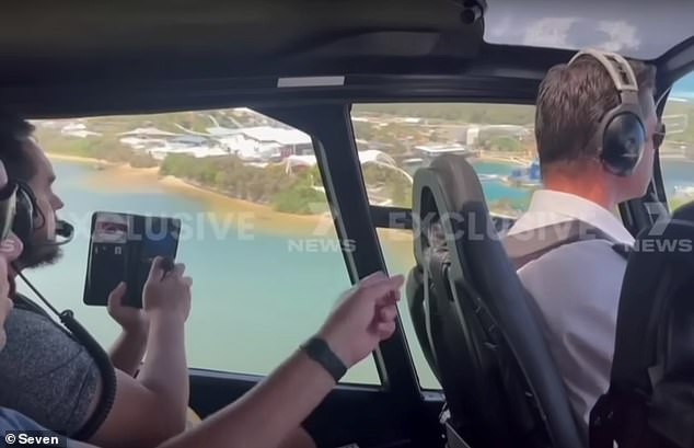 Two passengers have a different angle on the outside view and spot the danger, apparently signaling the plane until one frantically taps the pilot's shoulder to alert him.