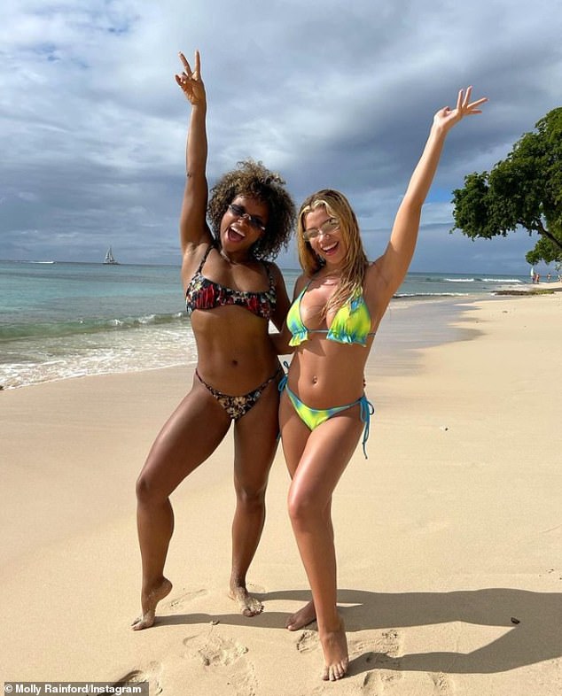 Sizzling: It comes after Molly caught up with Strictly co-star Fleur East as they posed up a storm for a fun photo during the lavish getaway.