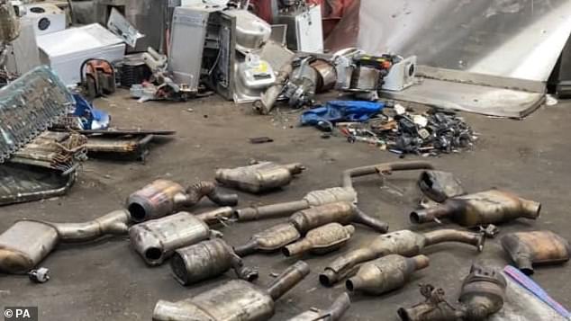 This photo, courtesy of the Metropolitan Police, shows a number of stolen catalytic converters recovered by officers in Lon