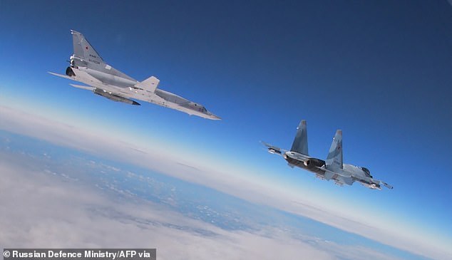 Tu-22M3 BACKFIRE medium bombers (pictured left) are also said to have moved further into Russia's territory.