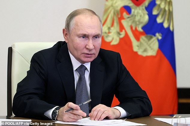 Vladimir Putin is terminally ill with cancer and will die very soon, Ukraine's military intelligence chief has said.  Pictured: Putin at the Novo-Ogaryovo state residence on the outskirts of Moscow on December 14, 2022