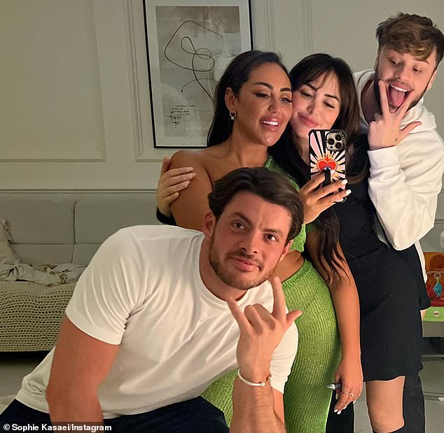 Family affair: Sophie spent the Christmas period celebrating with her new boyfriend Jordan and her cousin Marnie Simpson and fiancé Casey Johnson (pictured)