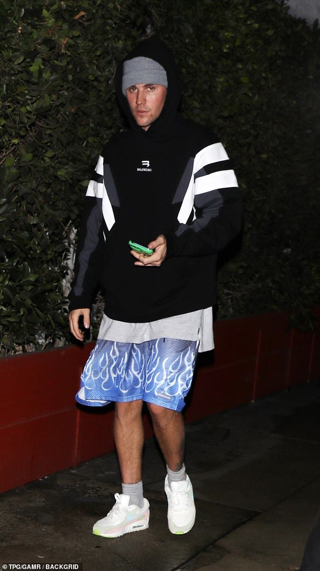 Justin, 28, went for a much more casual look as the couple left Giorgio Baldi's Italian restaurant after celebrating his friend Lauren Perez's birthday.