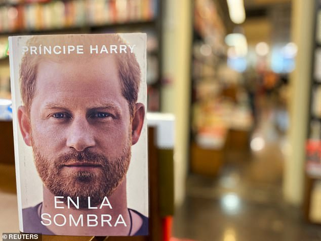 The Duke of Sussex made the admission while also addressing the media's fascination with his genitalia and rumors that he was uncircumcised (pictured, a copy of the autobiography that hit shelves earlier in Spain)