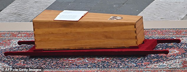 The coffin of Pope Emeritus Benedict XVI is pictured at the start of his funeral mass at St. Peter's square in the Vatican