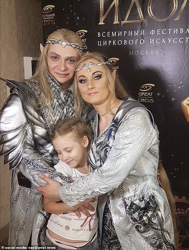 Alexey Makarenko, a professional trainer, is pictured with his wife Olga Borisova, who also trains lions with him at the circus