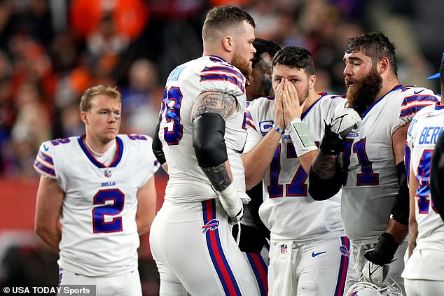 Buffalo Bills quarterback Josh Allen (17) and Buffalo Bills react as Buffalo Bills safety Damar Hamlin (3) is treated on the field after a first quarter collision against the Cincinnati Bengals at Paycor Stadium.