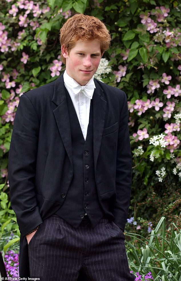 Harry writes in his book: 'I was 21 years old, cut off from the real world and wrapped up in privilege, and I thought that word was the same as Yankee.  Harmless.'  (Pictured: Harry at Eton in his traditional school outfit)