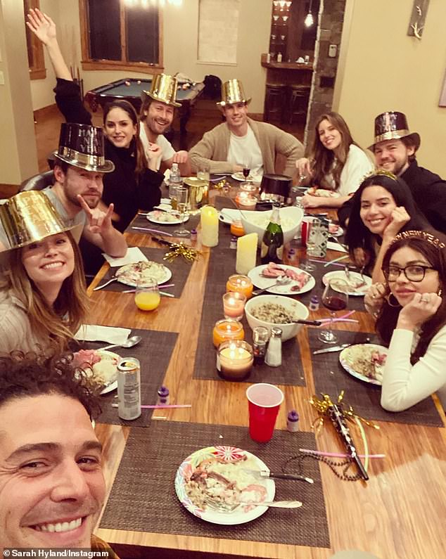 Party time: The whole group of friends posed together with New Years celebration themed accessories.