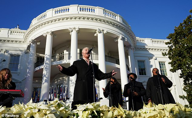 Singing her heart out: Last month, Sam performed at the Respect Marriage Act signing ceremony at the White House in Washington.