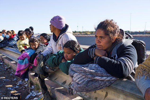 Biden's plan includes bringing up to 30,000 immigrants each month from Cuba, Haiti, Nicaragua and Venezuela to try to reduce illegal crossings.  Pictured: Migrants from Venezuela wait in line to be processed by Border Patrol in El Paso, Texas, on Wednesday, January 4.