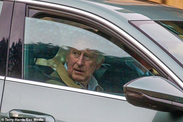 King Charles III looks on as he leaves Sandringham on Thursday after leaks of Harry's memoir began.