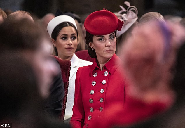 The Duchess of Sussex sits behind the then Duchess of Cambridge as they attend the Commonwealth Service at Westminster Abbey.