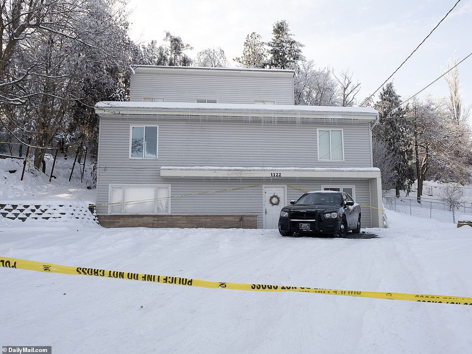 Police tape is seen outside the Moscow, Idaho property where four college students were killed