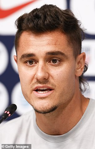 Aaron Long at a press conference in Qatar