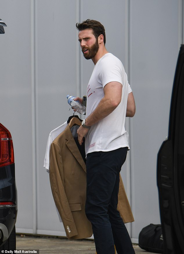 Felix showed off his muscular frame and bulging biceps in a white Muhammad Ali T-shirt