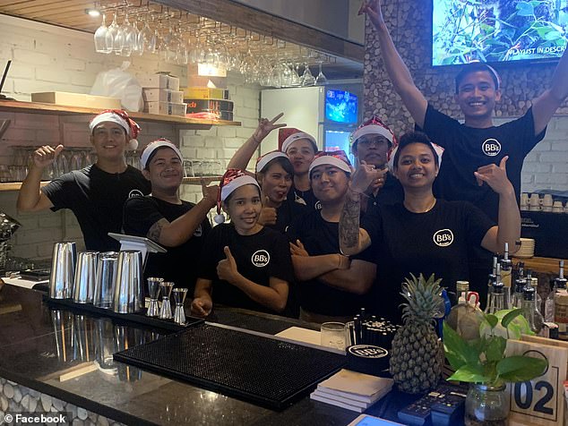 The owners of a restaurant named after the popular 'Bali Bogans' Facebook page said they had lost sleep after zealous Australians tried to kill their dreams of opening a place on the holiday island (pictured, staff at the BB's Bali Bogan Bar & Bistro)