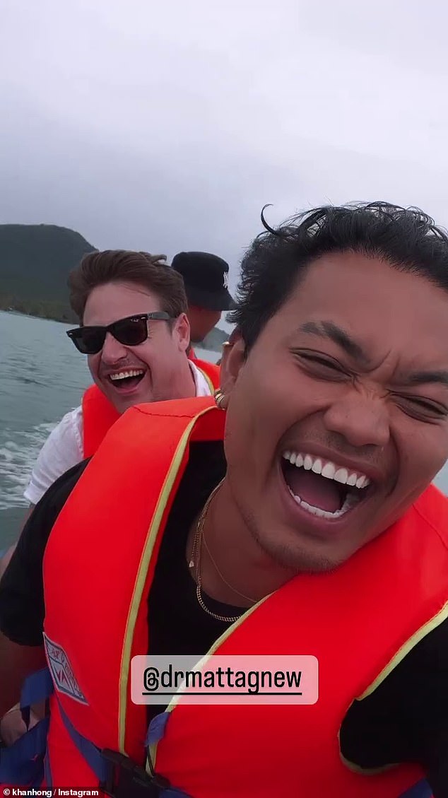 Smiling and laughing, Matt and Khanh posed for the video footage while both wearing life jackets.