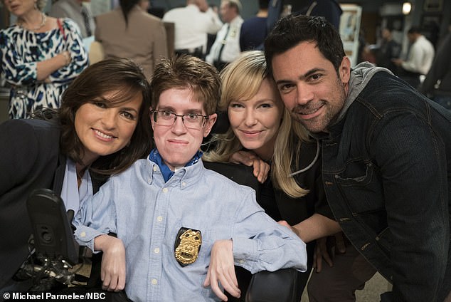 Andrew pictured with part of the cast of the Law and Order Special Victims Unit in New York