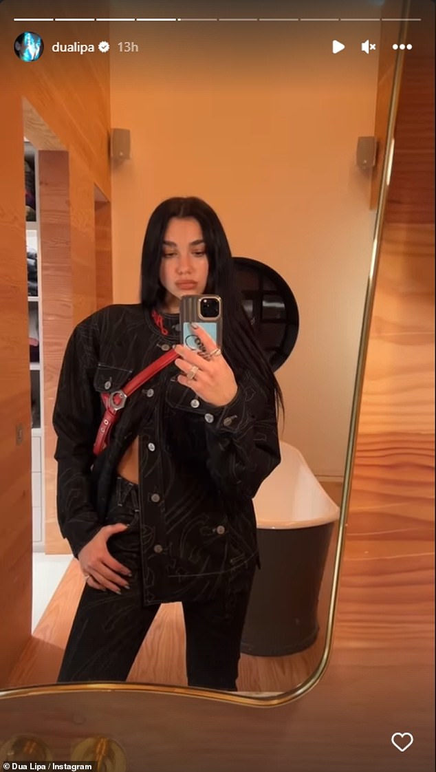 Strike a pose: The Don't Start Now hitmaker posed for a mirror selfie wearing the cool outfit, who also flaunted her slender physique with a few buttons undone on her jacket