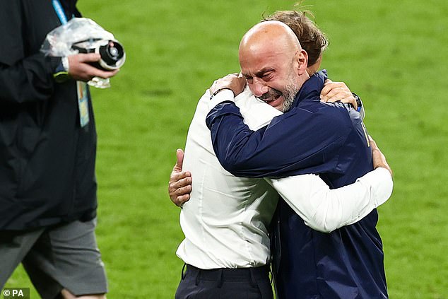 The couple embrace after Italy defeated England on penalties in the Euro 2020 final last year.