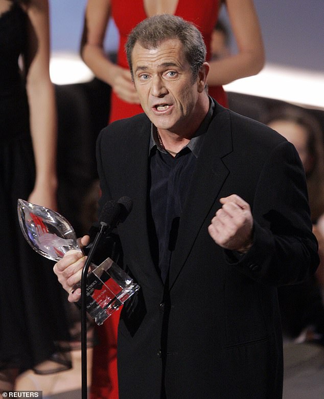 Winner: Passion Of The Christ earned a whopping $612 million worldwide on a comparatively small budget of $30 million, making it the highest-grossing R-rated film at the US box office (Mel appears pictured accepting the People's Choice Award for the film in 2005)