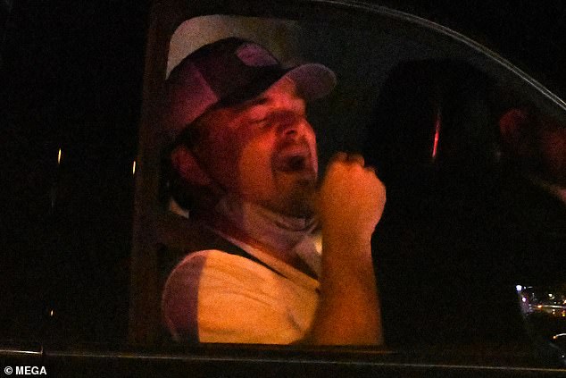 It's a Hard Life: Earlier in the day, Leonardo was seen yawning in exhaustion after returning from his raucous holiday in St Barts, where he'd been partying with a bunch of hotties