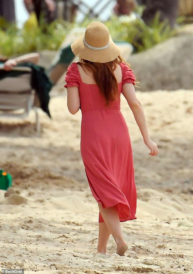 Stunning: The Australian actress, 46, looked effortlessly chic as she stepped out in a scarlet summer dress with ruched sleeves