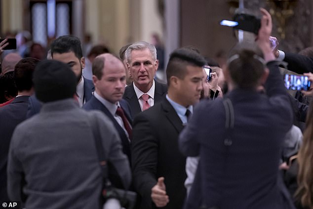 Rep. Kevin McCarthy is captured leaving the House chamber Thursday night after five additional rounds of voting, 11 total, didn't warrant him the speakership job