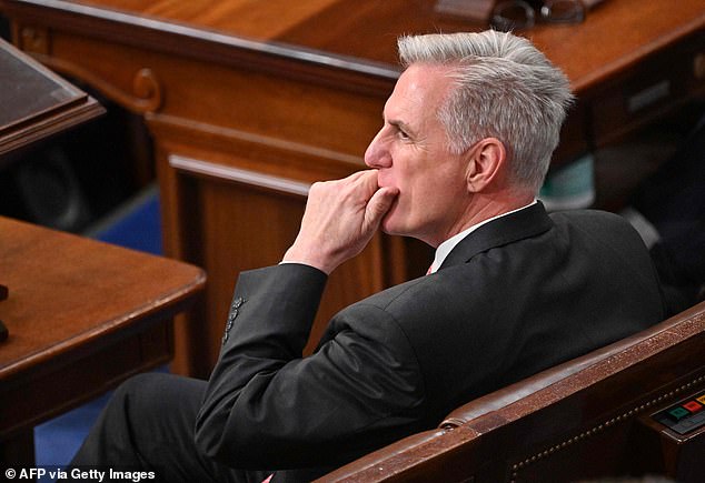 US Republican Representative Kevin McCarthy listens before the House of Representatives votes for a seventh time for a new speaker at the US Capitol in Washington, DC