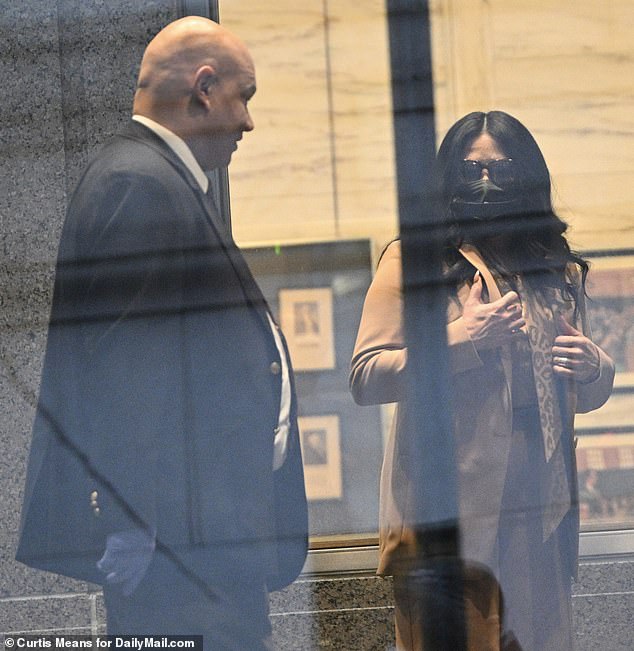 Shah is shown inside the courthouse.  He added a COVID-19 mask before entering the courtroom.