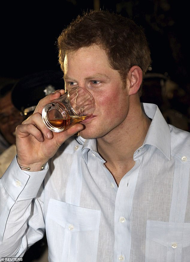 Harry, photographed enjoying a drink in Belize in 2012, reportedly enjoyed alcohol-fueled trips abroad when he was younger.