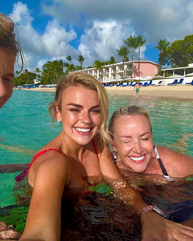 Family time: He then posed for selfies with his family after they ring in the New Year together