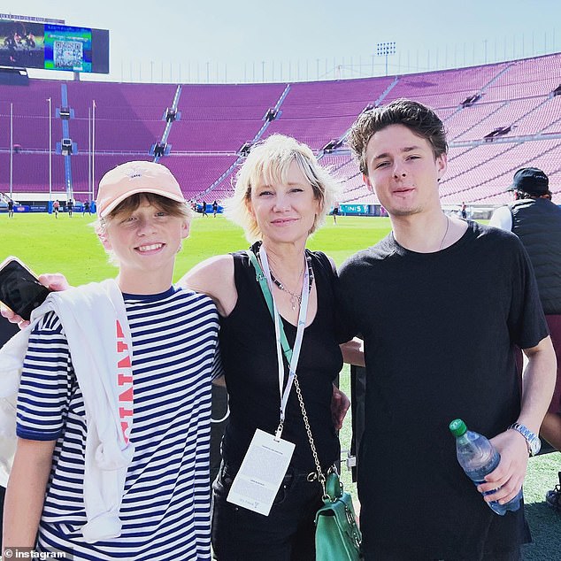 Family: Heche pictured with her sons Homer and Atlas Heche Tupper