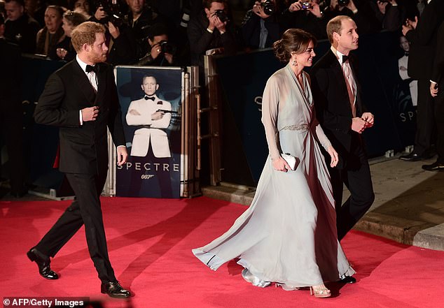 Prince William, Kate and Prince Harry arrive for the world premiere of the new James Bond film 'Spectre' at the Royal Albert Hall in London on October 26, 2015.