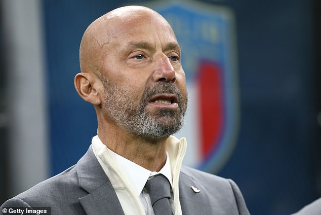 Gianluca Vialli, pictured on duty in Italy in September, has died at the age of 58 from cancer.