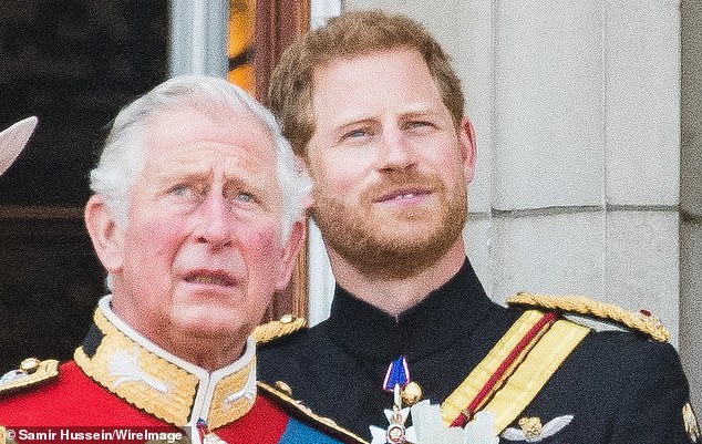 Charles, pictured here with Harry, would practice headstands and beg people not to open the door and walk in on him